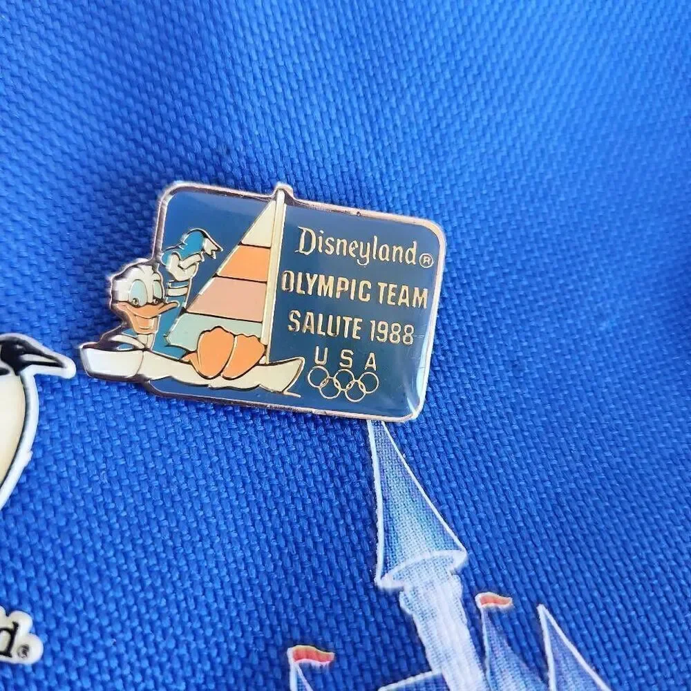 90s Disneyland one sling backpack 2 80's Disney pins penguin Sea World vintage